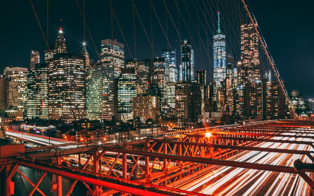 Photo of new york city skyline at night, by Adil Rahman on Unsplash
